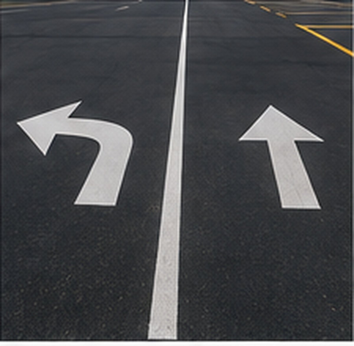 Directional arrow striping guiding traffic flow